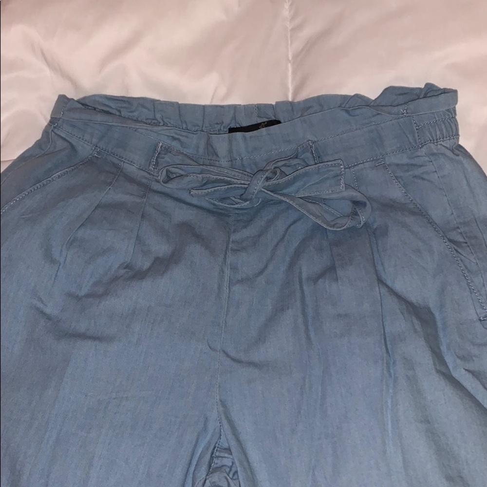 Blue flared pants with a stretchy waist band